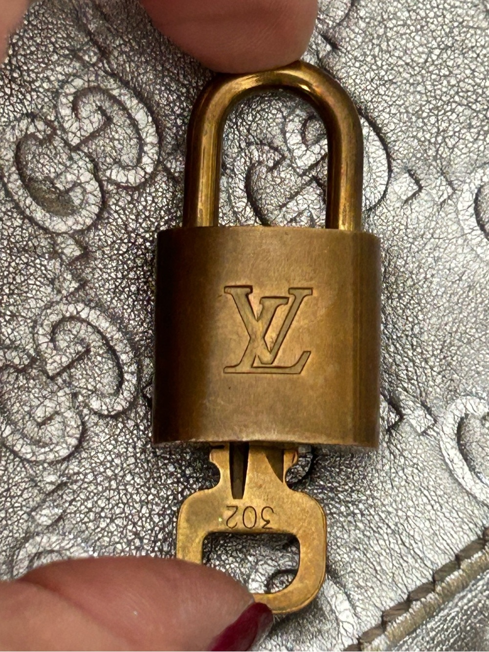 Louis Vuitton Lockn& key 
Stunning piece 
Great condition